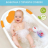 ROXY-KIDS bath with anatomical slide and drain orange